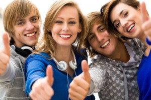 Photo of group of kids giving thumbs up to your Abbotsford Dentist