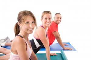 HAppy group of people doing yoga in Abbotsford